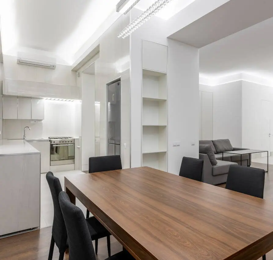 Dining area of a residential interior by Prarthna Interiors